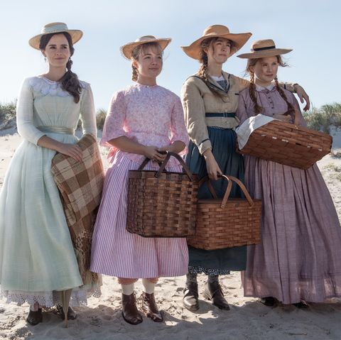 Poster image of the four March girls standing next to each other on a beach with picnic baskets.