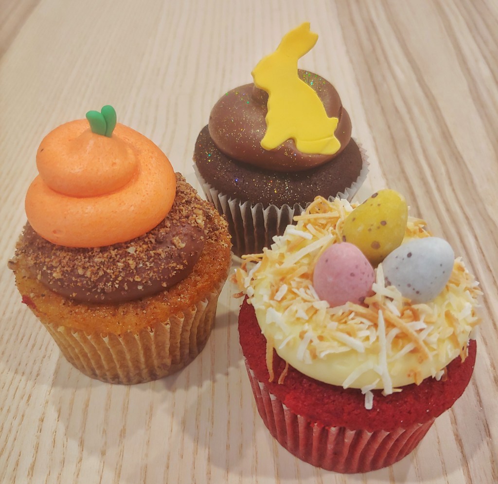 Close-up shot of three Easter themed cupcakes
