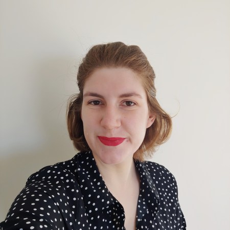 A head shot with the Pow Wow Lipstick applied.