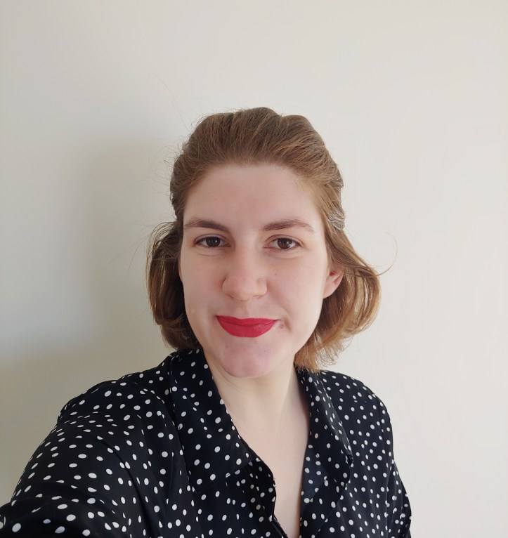 A head shot with the Pow Wow Lipstick applied.