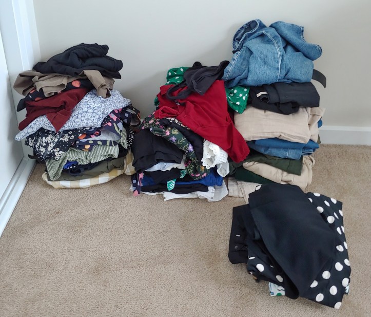 Photo of piles of clothes.