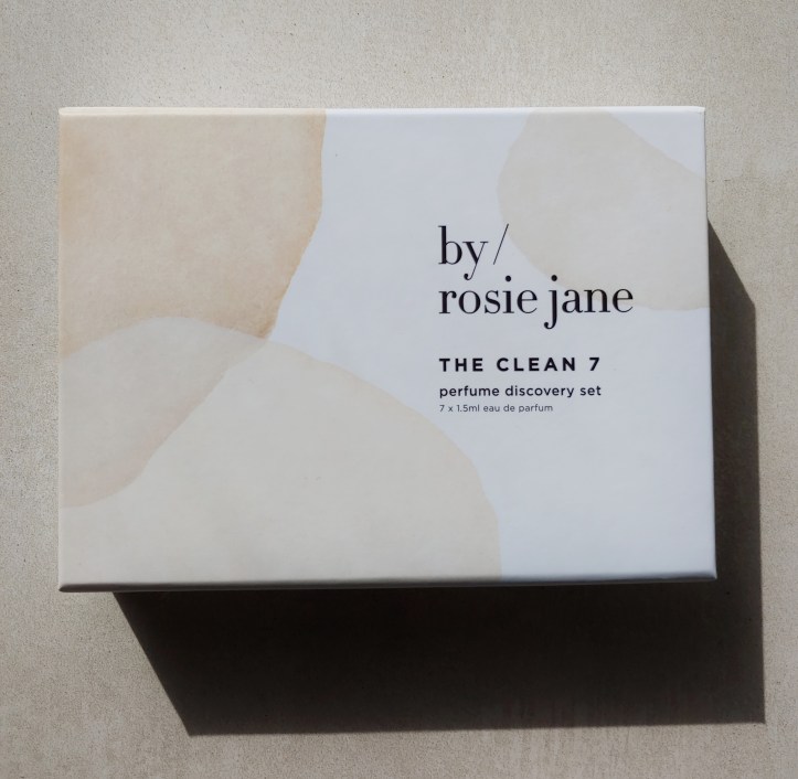 Close up of the By Rosie Jane Perfume Discovery Set box, with abstract decorations in neutral cream colours.